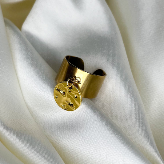 Bague avec pendentif rond à texture